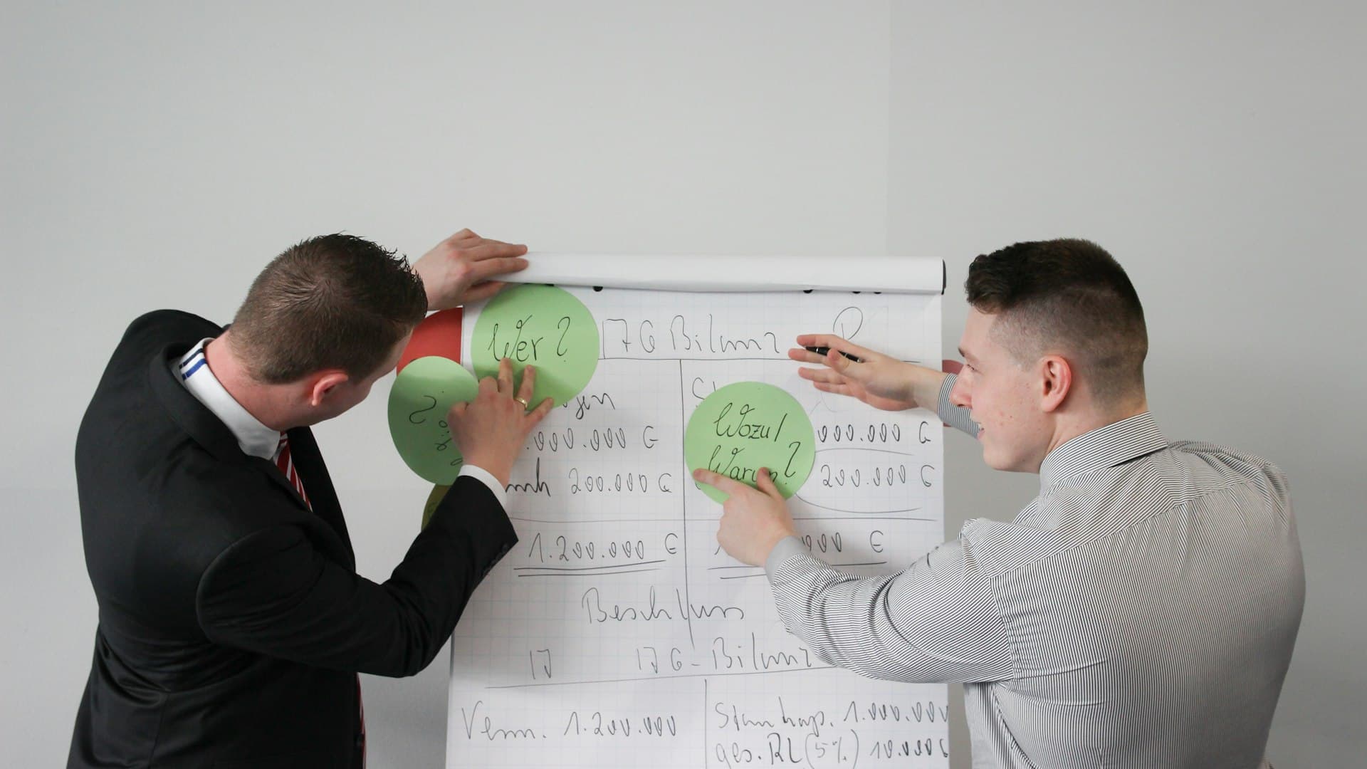 Two students presenting a sponsorship deck